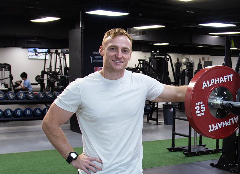 Man in active wear standing in gym