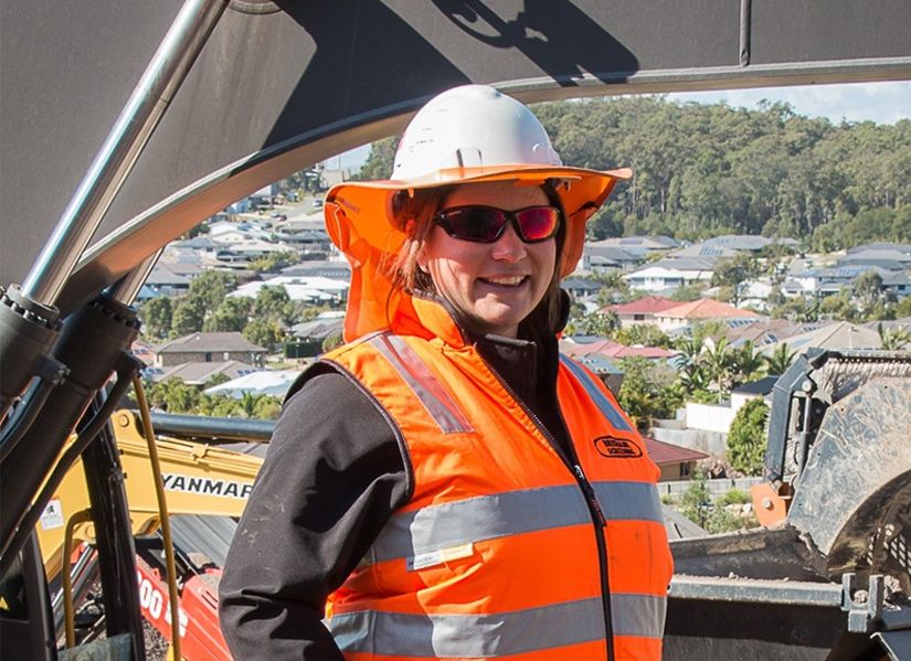 Alison Price in high visibility construction gear.