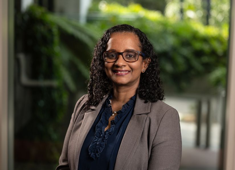 Associate Professor Wasana Bandara smiles towards the camera 
