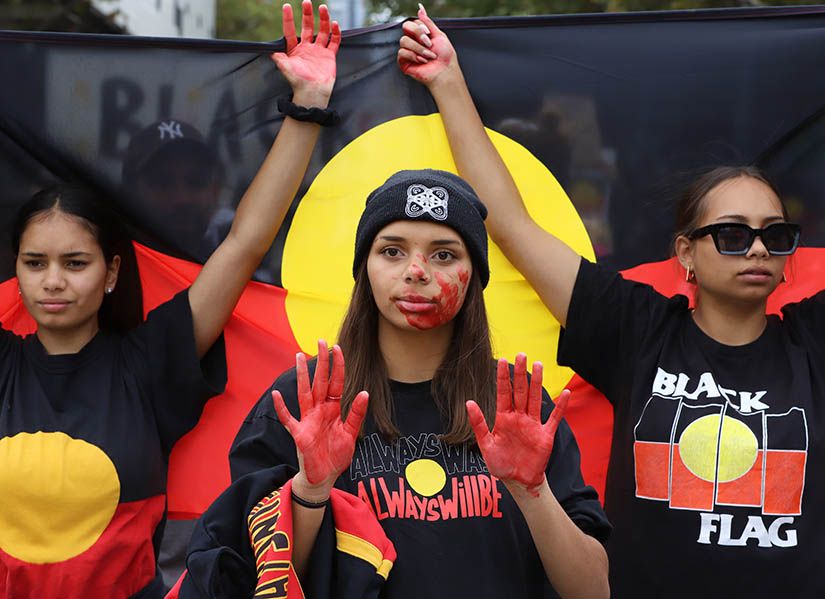 Three First Nations women protesting