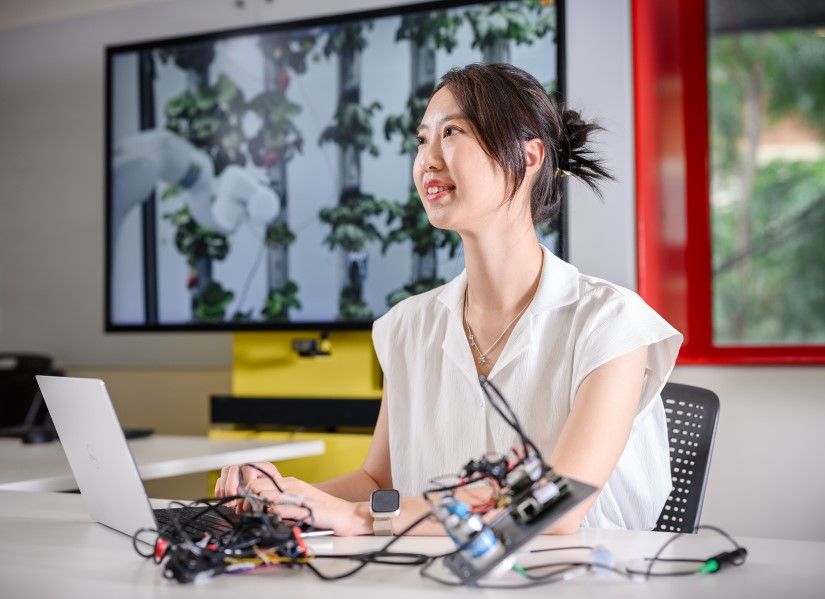 Gina working with electrical components