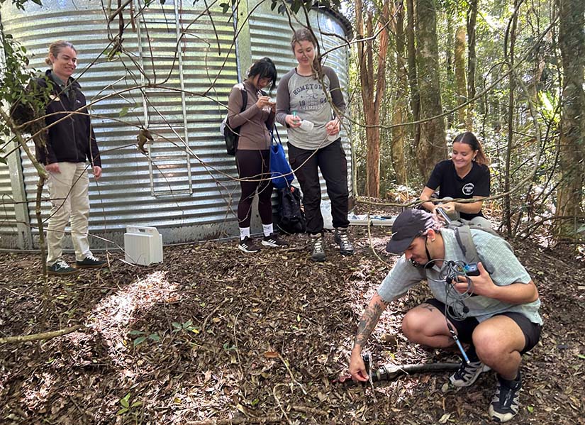 Student collecting water samples