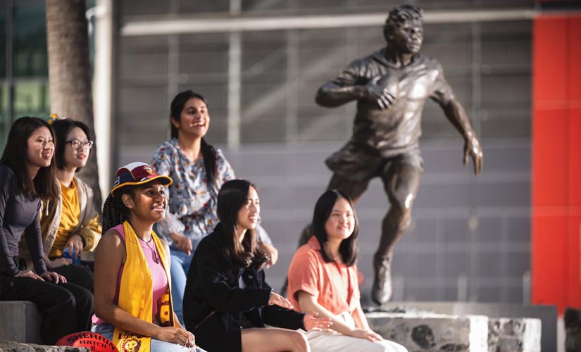 Students at a sports stadium