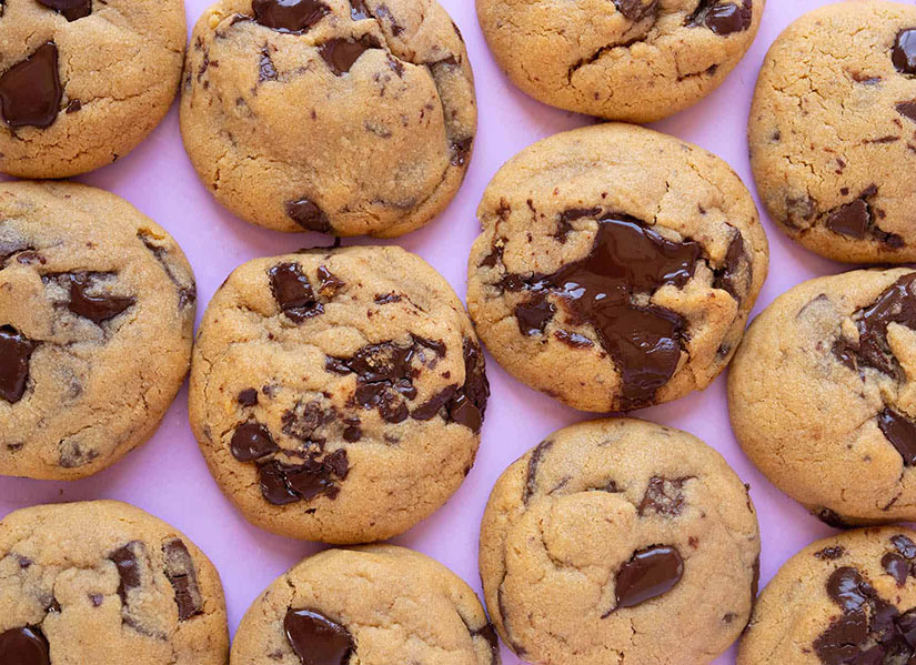 Overhead flatlay of a batch of peanut butter and chocolate chip cookies