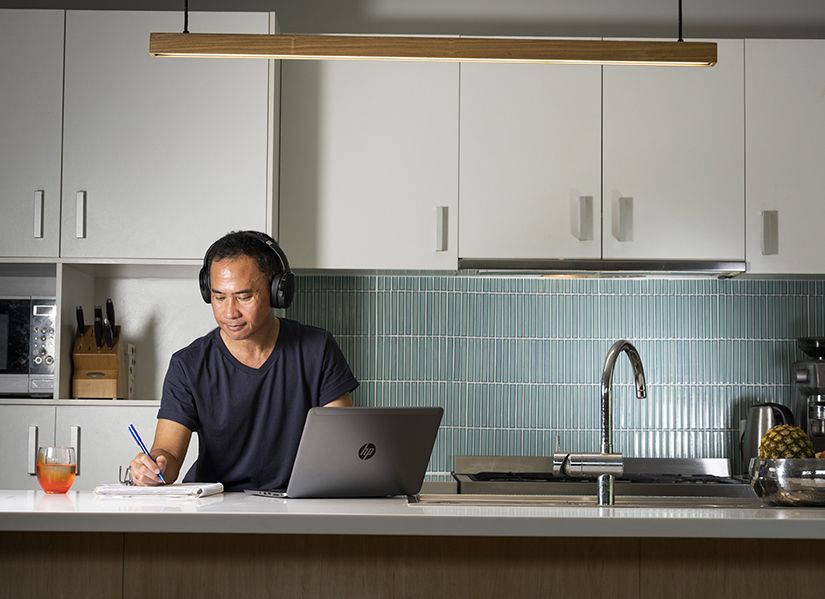 Male student studying at home