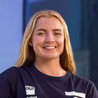QUT student Madison Stibbe smiling towards the camera