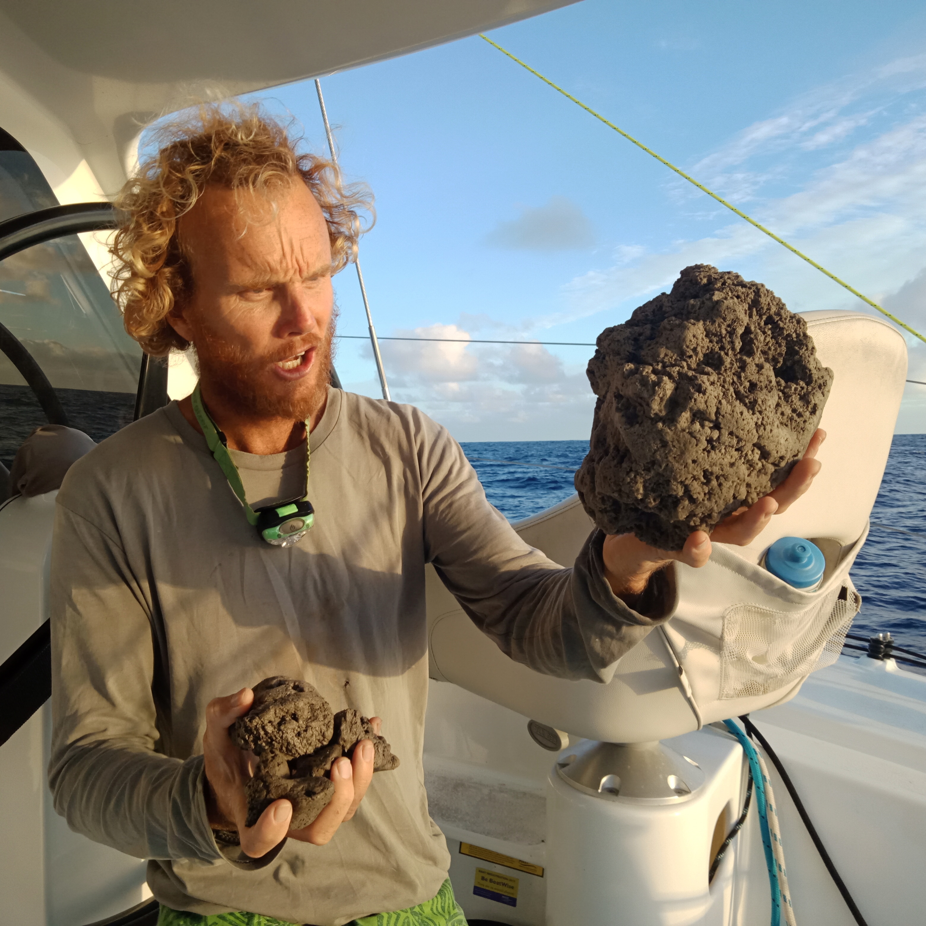   Michael Hoult, from SailSurfROAM, with pumice he enounctered from the eruption.  