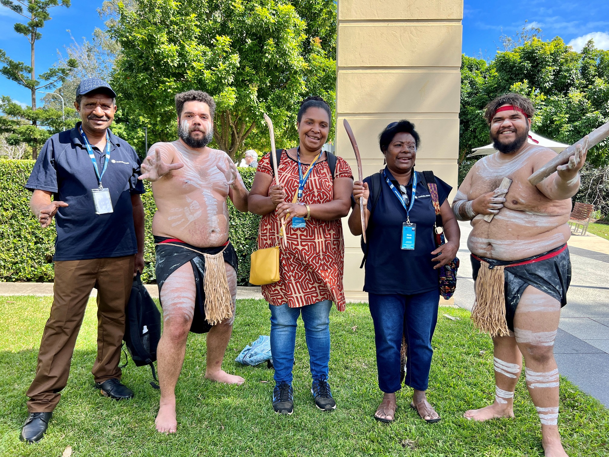 Nunukul Yuggera Aboriginal Dance Company dancers welcome PNG Health Science students to QUT.